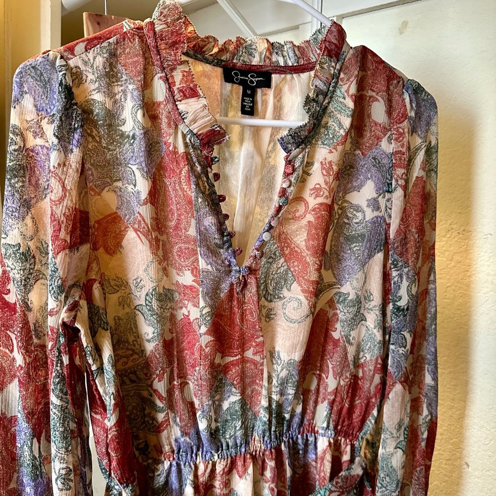 Lovely dress, muted shades, so versatile